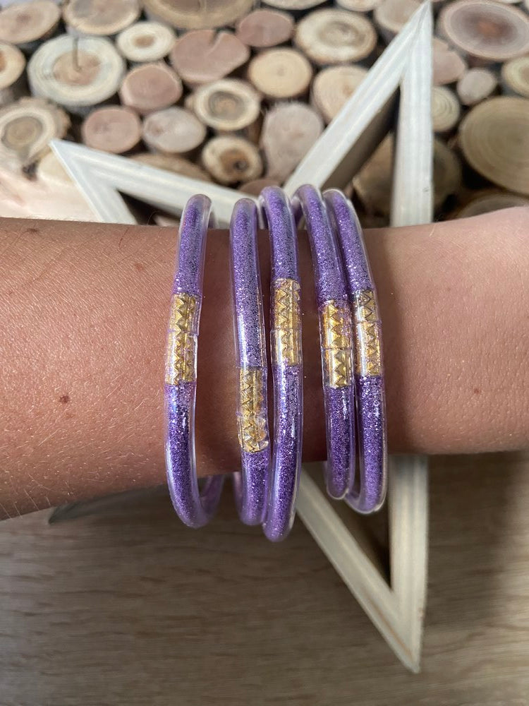 Bracelets tressés violets et perlés célestes couleur dorée - Lot de 5 Bracelets tressés violets et perlés célestes couleur dorée - Lot de 5